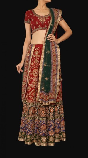 green blend lehenga with intricate embroidery all over.