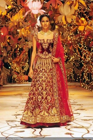 Make yourself stunning and trendy zardosi work maroon bridal lehenga