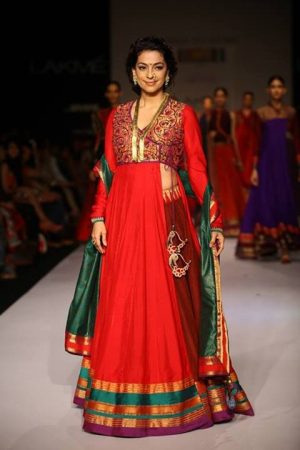 Wonderful crimson lehenga with eco-friendly green,purple and golden Gotta and Embroidery carry out