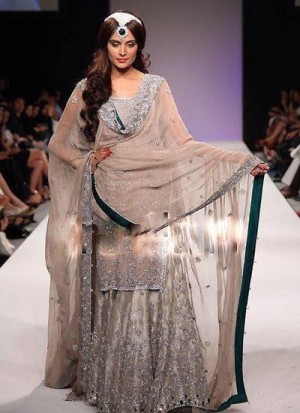 Heavenly surface grey color lehenga intricate jarkan hold the task accomplished