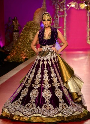 Gorgeous Purple Velvet Bridal Lehenga Choli with Zari Work at Zikimo