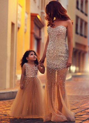 Charming Party Wear Mom-Daughter Beige Gown Set at Zikimo