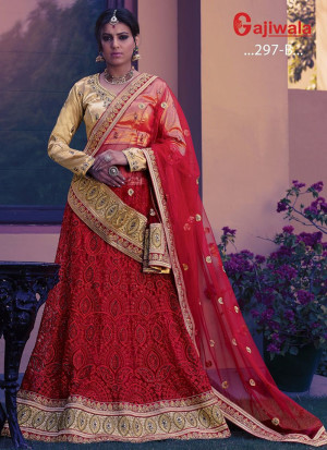 Red Heavy Embroidered Indian Wedding Wear Net Lehenga With Golden choli at Zikimo