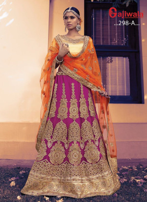Magenta Heavy Embroidered Indian Wedding Wear Net Lehenga Choli With Orange Dupatta at Zikimo