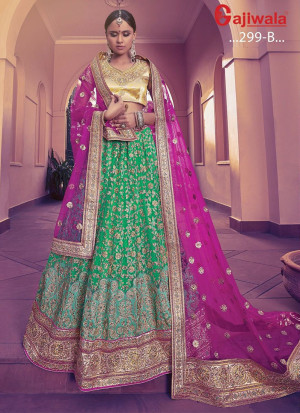 Green Heavy Embroidered Indian Wedding Wear Net Lehenga Choli With Purple Dupatta at Zikimo