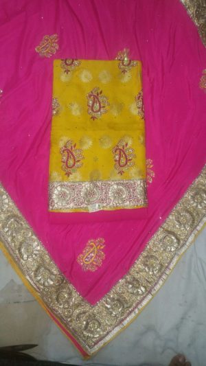 Yellow Pure Dupiun Punjabi Salwar Suit With Pink Chiffon Duppta At Zikimo